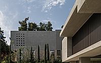 014-residence-in-dionysos-monolithic-concrete-dwelling-nestled-in-penteli.jpg