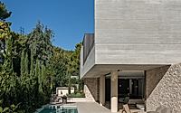 015-residence-in-dionysos-monolithic-concrete-dwelling-nestled-in-penteli.jpg