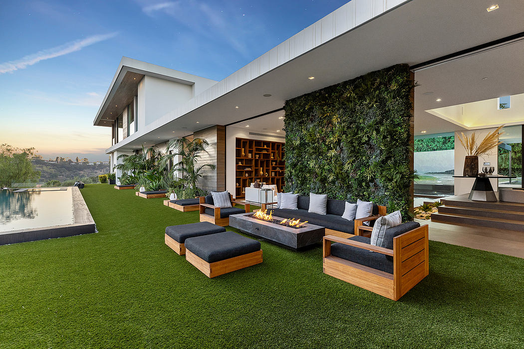 Sleek modern architecture with lush vertical garden, cozy outdoor seating area, and firepit.