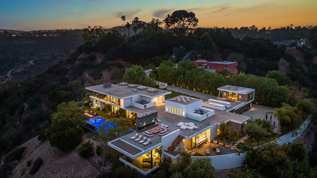 Stunning contemporary villa with minimalist design, expansive outdoor terraces, and pool.