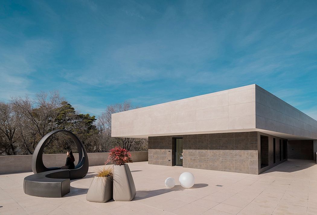 Striking modern architecture with clean lines, contrasting materials, and sculptural elements.