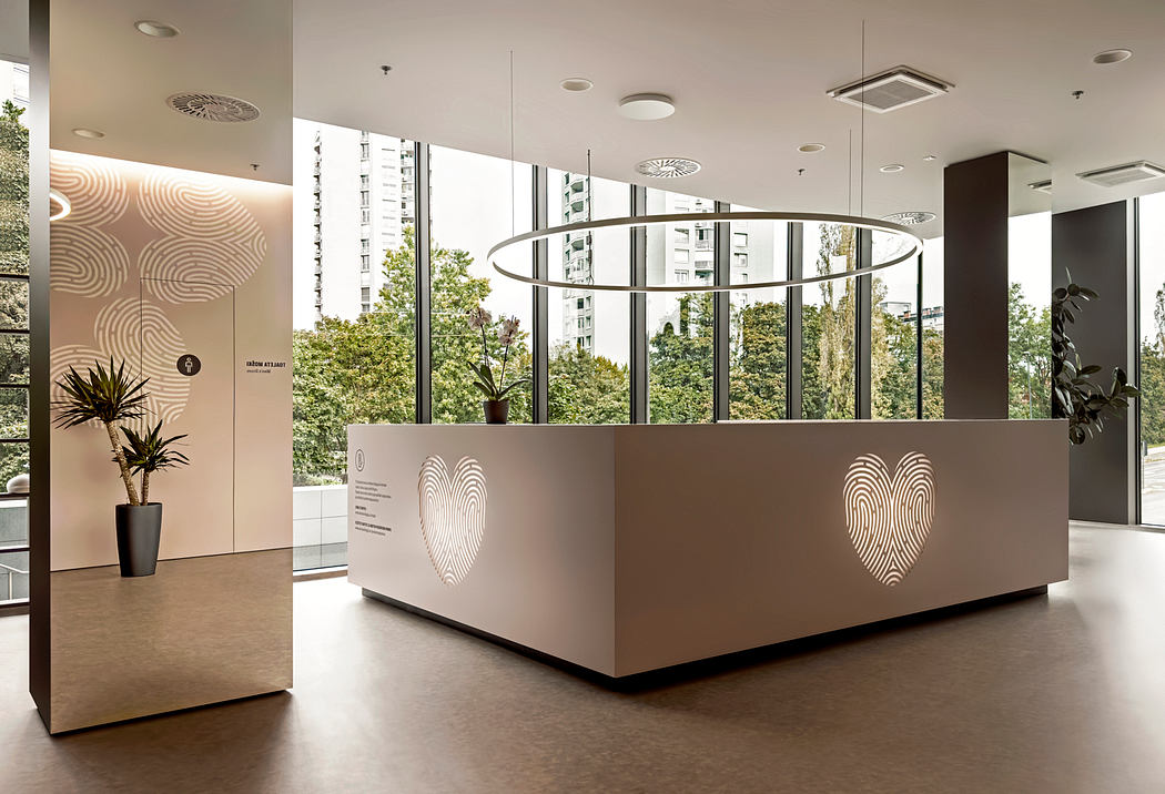 Sleek modern lobby with geometric lighting fixtures, potted plants, and a stylized reception desk.