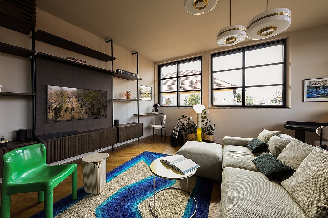 Modern living room with wood accents, geometric rug, and sleek TV console.