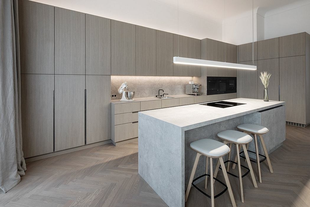 Modern kitchen with sleek gray cabinets, concrete countertop, and minimalist stools.