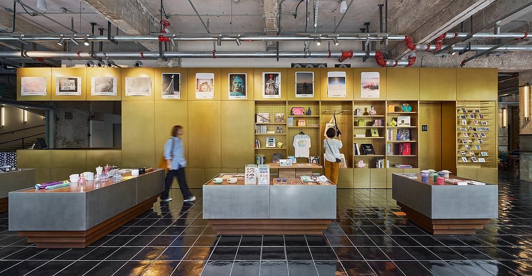 Vibrant industrial-style interior with modular shelving, art displays, and a service counter.
