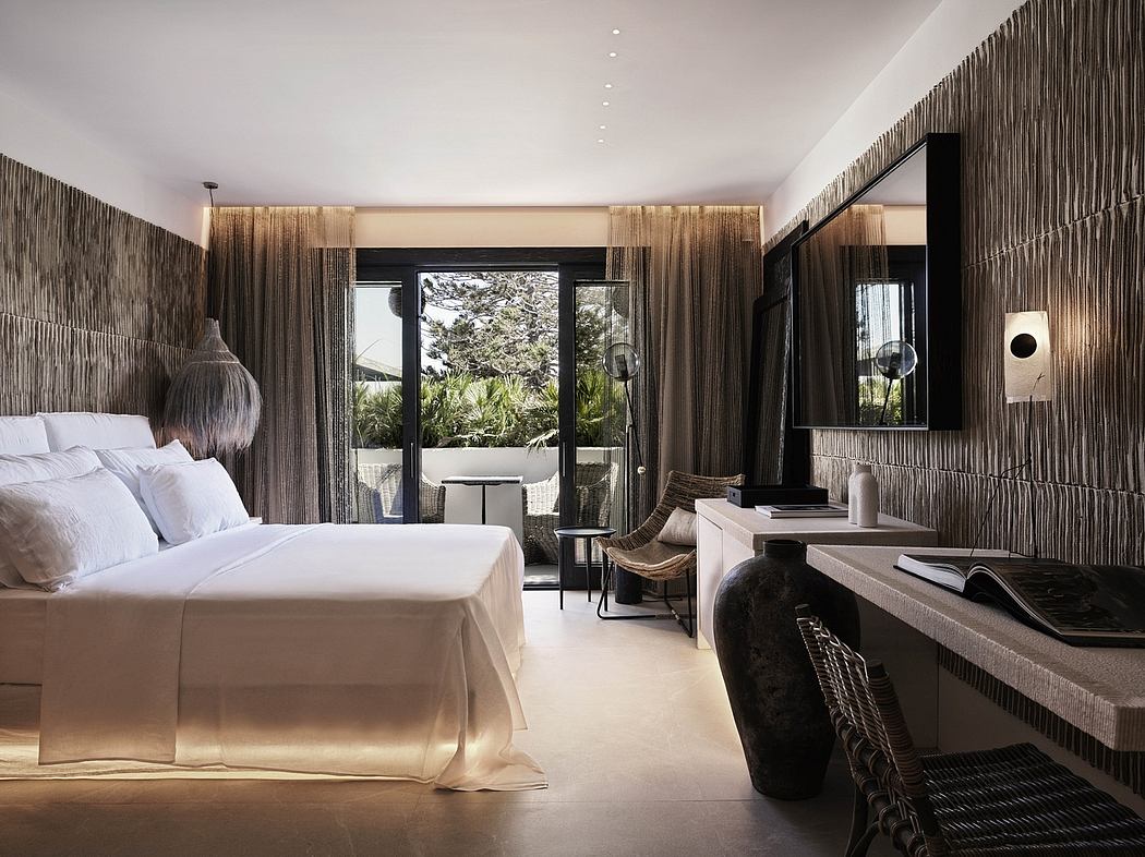 Elegant bedroom with modern, textured walls, black accents, and lush garden view.