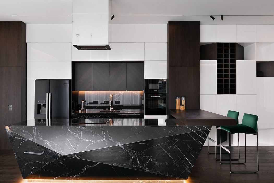 Sleek, modern kitchen with black marble countertops, dark wood cabinetry, and minimalist appliances.