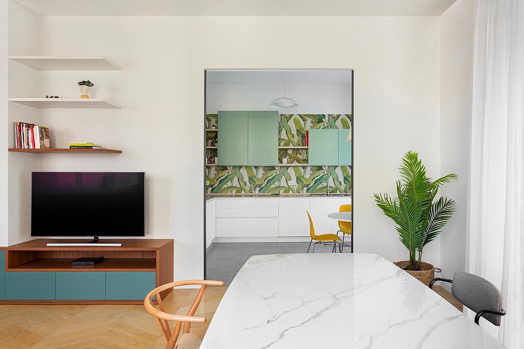 Minimalist living room with marble dining table, wooden TV console, and patterned cabinets.