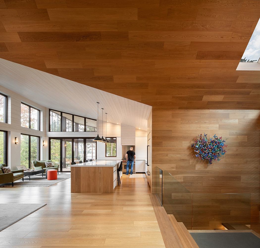 Warm-toned wooden panels line the walls and ceiling, complementing the modern interior.