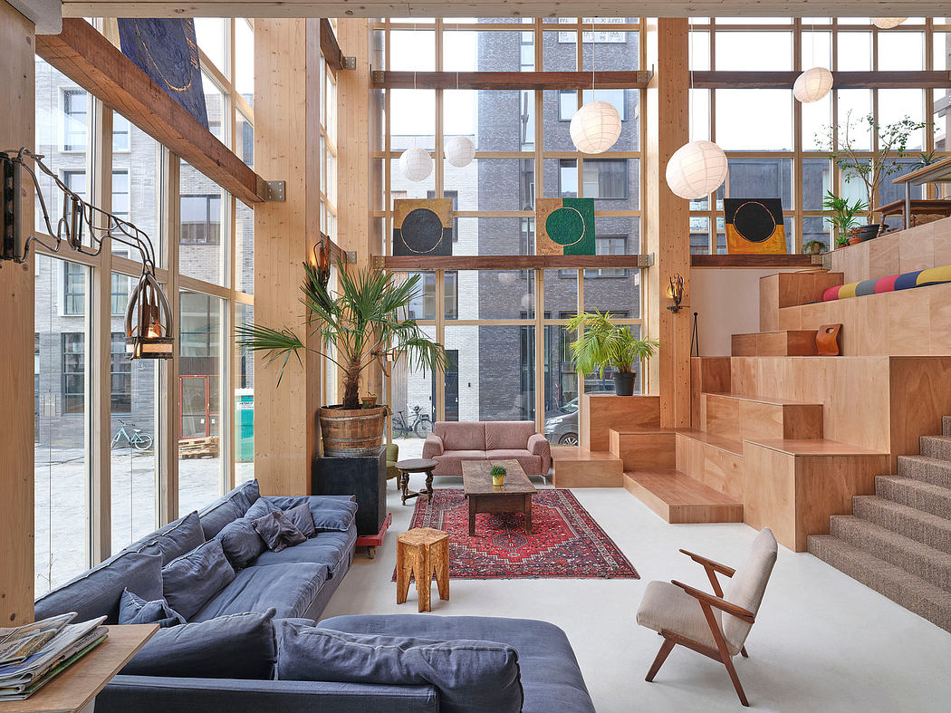 Spacious, modern interior with wooden structures, cozy seating, and decorative elements.