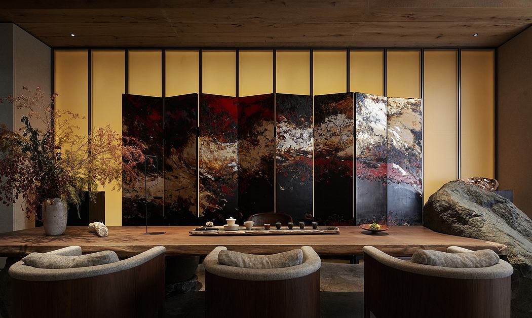 Elegant Japanese-inspired interior with striking wall panels, stone accents, and minimalist design.