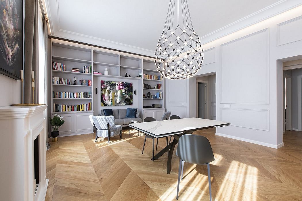 Elegant and modern living room with sleek bookshelves, dining table, and a stunning lighting fixture.