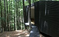 006-half-tree-house-unique-cabin-built-among-trees.jpg