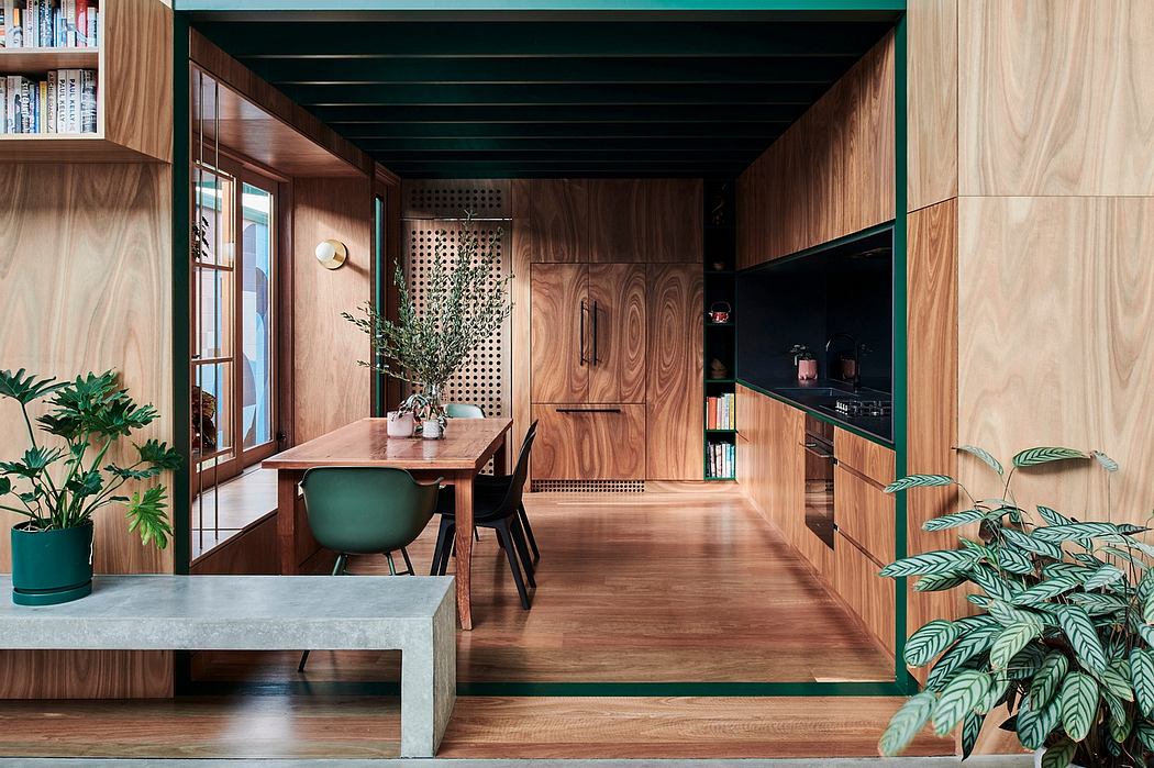 Warm, earthy tones; mix of wood, concrete, and greenery; cozy, inviting space.