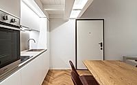 007-quinta-parete-revitalizing-bolognas-historic-apartment-design.jpg