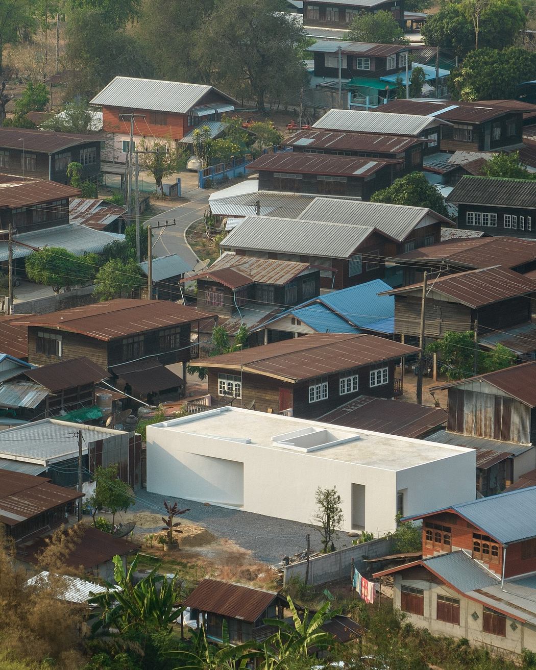 A colorful and densely packed residential area with a variety of architectural styles.