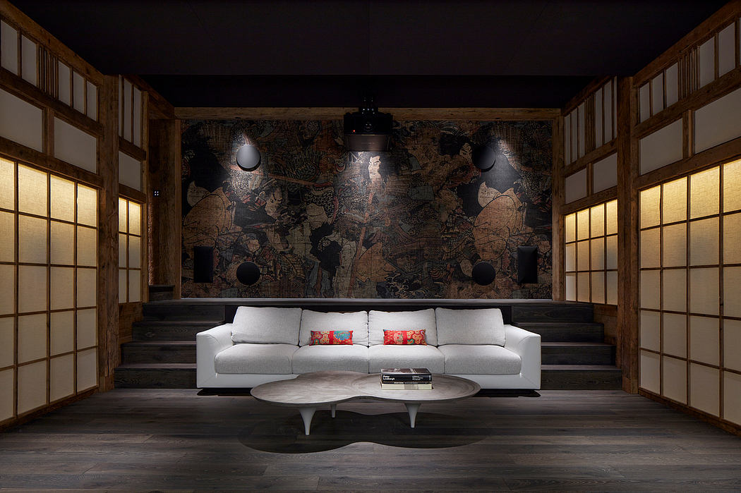 A modern Japanese-inspired lounge with a striking mural wall, sleek furniture, and recessed lighting.