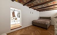 009-quinta-parete-revitalizing-bolognas-historic-apartment-design.jpg