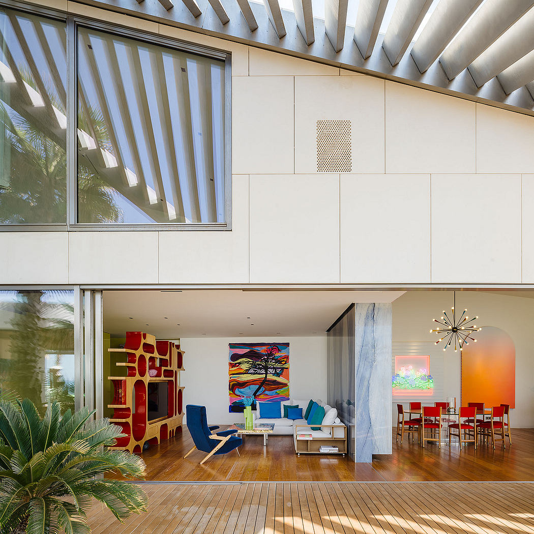 Striking modern architecture with vibrant decor, inviting open layout, and lush greenery.