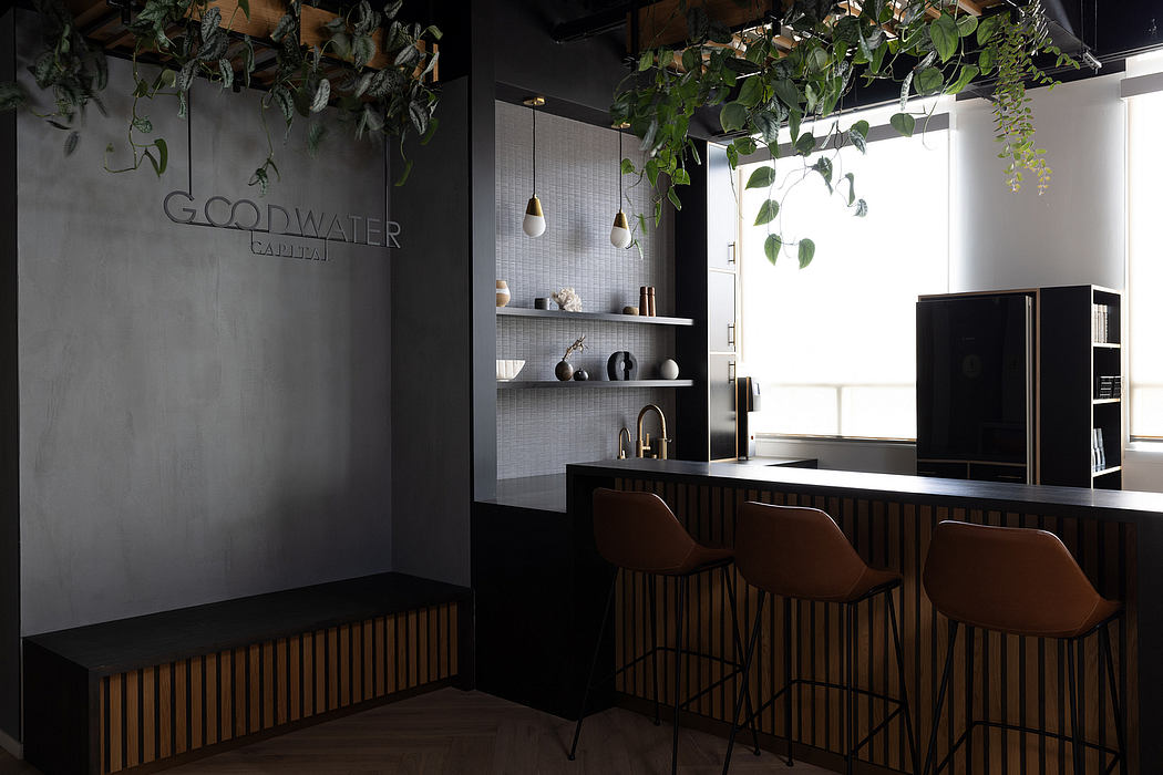 Modern industrial-style kitchen with dark walls, floating shelves, and hanging plants.