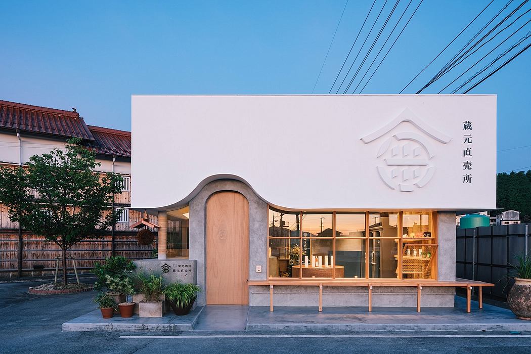 Elegant Japanese-inspired architecture with a wooden entrance and modern interior.