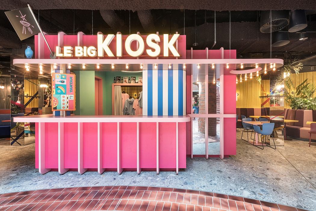 Vibrant, modern kiosk with colorful, geometric design and playful lighting elements.