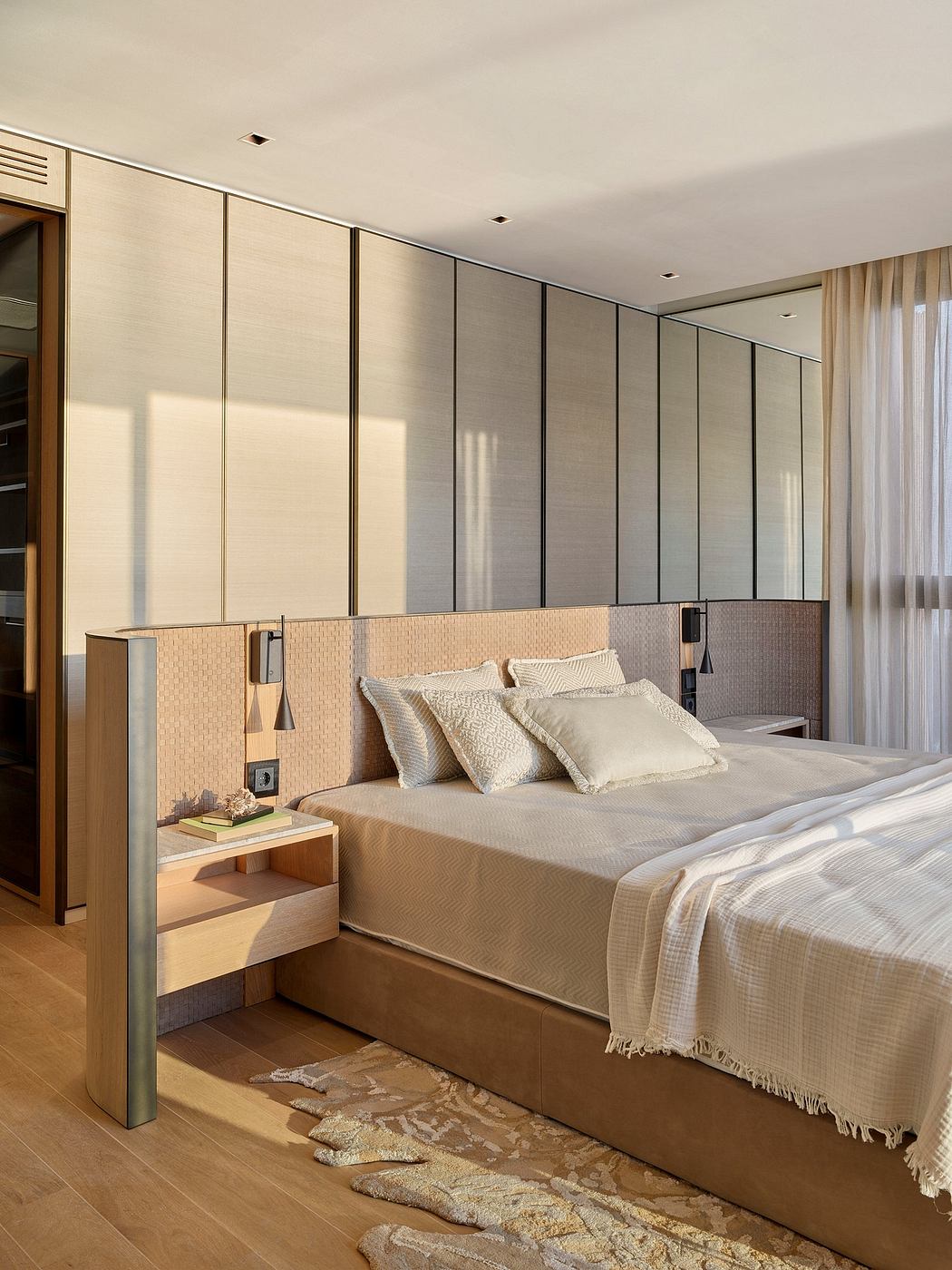 Sophisticated bedroom design showcases clean lines, neutral palette, and integrated storage.