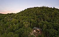 011-mont-ste-marie-cabin-nestled-in-canadas-scenic-wilderness.jpg