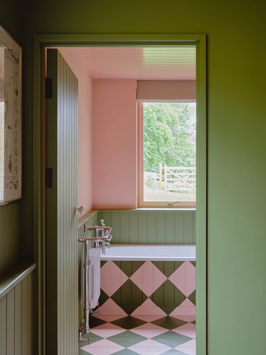 Vibrant pink and green color palette in a cozy, retro-inspired bathroom.