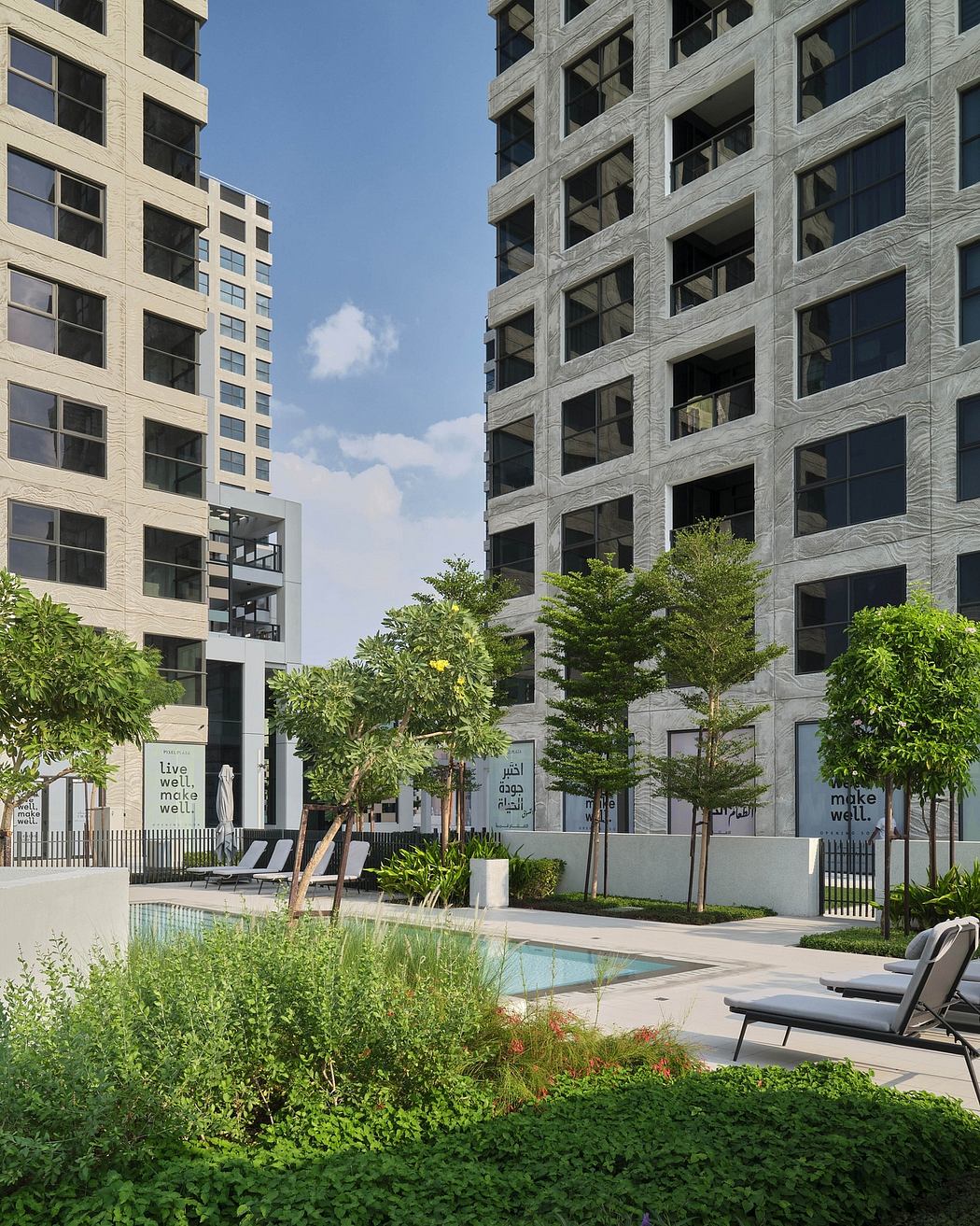 Lush greenery surrounding a modern residential building with intricate stone facade.