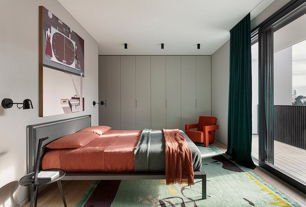 Sleek modern bedroom design with gray built-in storage, red accents, and patterned rug.