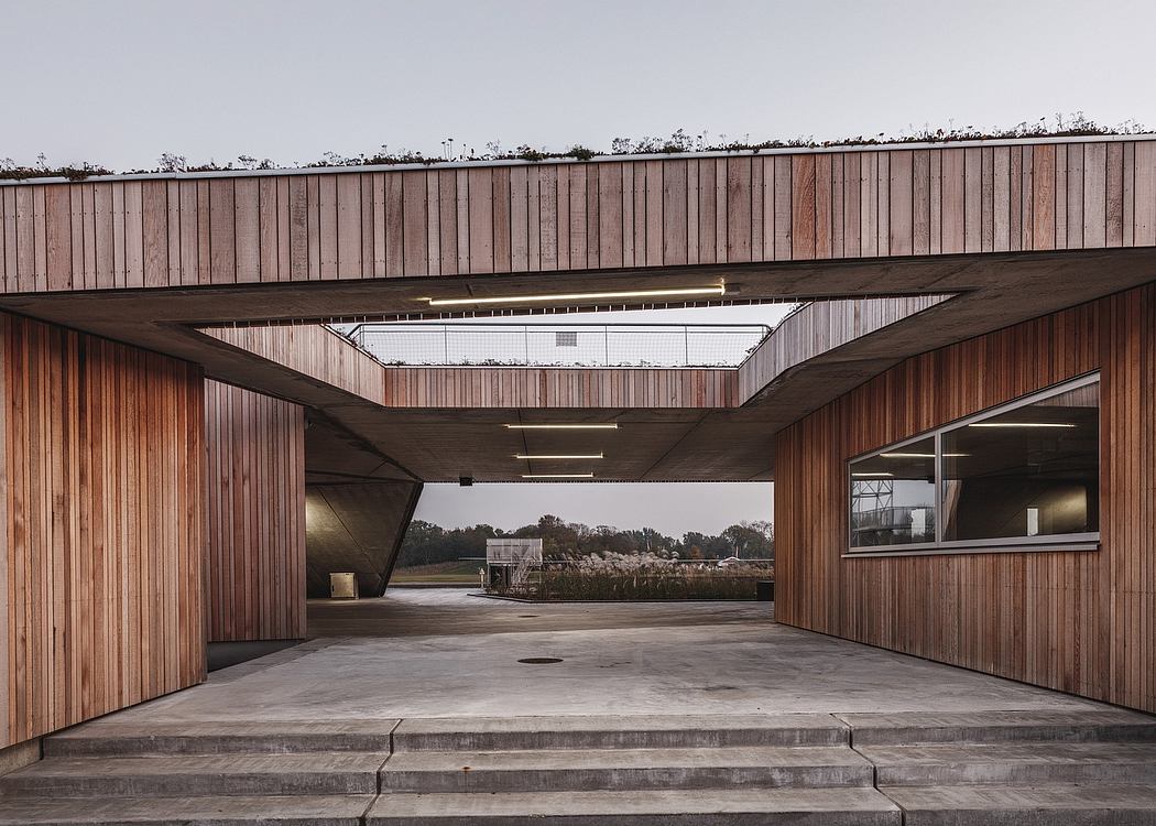 Striking architectural details with wooden paneling, geometric patterns, and expansive views.