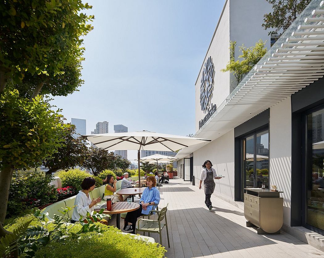 Vibrant outdoor seating area with modern architectural details and greenery.