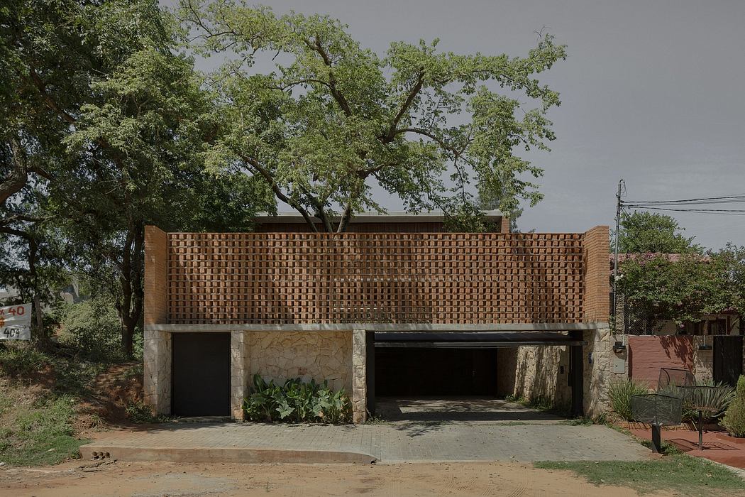 Striking brick and stone facade with intricate pattern, creating a bold architectural statement.