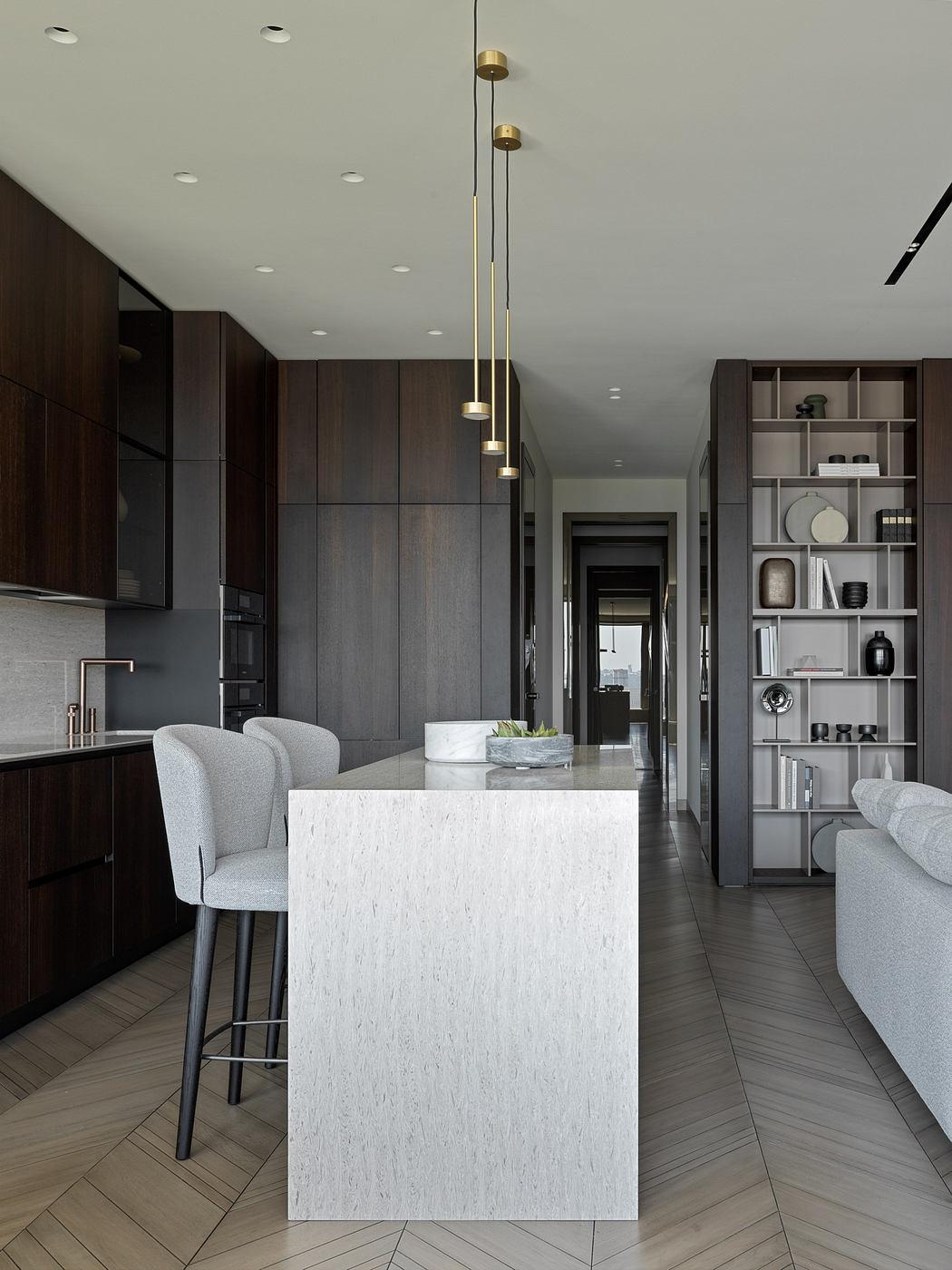 Sleek, modern kitchen with dark wood cabinets, marble countertop, and pendant lighting.