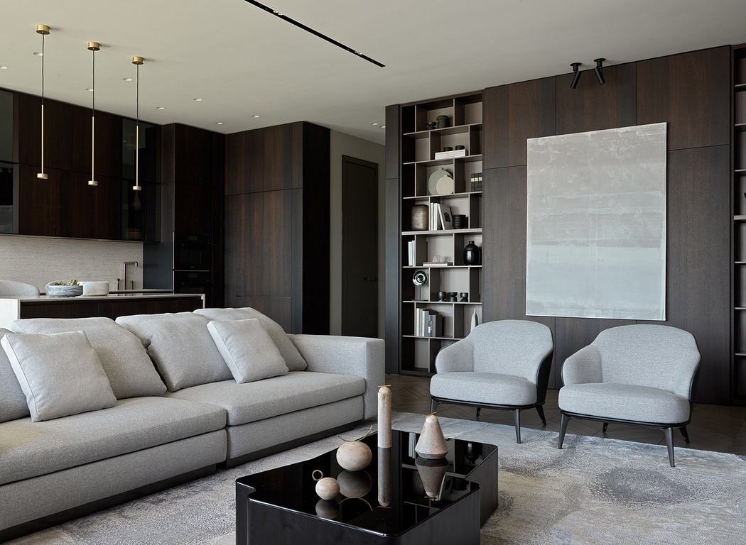Sleek, modern living room with dark wood cabinetry, neutral furniture, and minimalist decor.