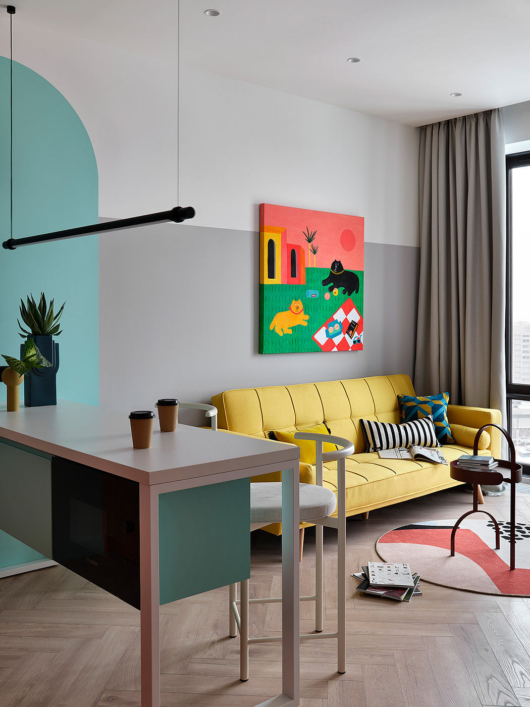 Modern living room with vibrant colors, geometric shapes, and minimalist furniture.
