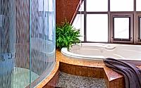 Modern Curved Glass Shower Design by Bjella Architects