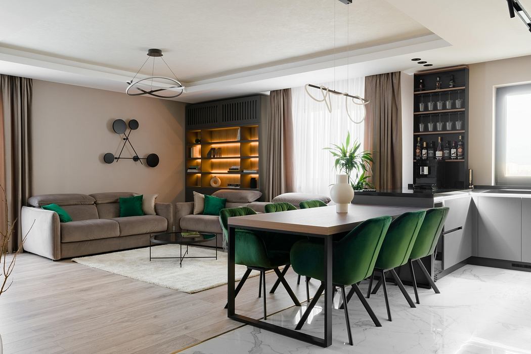 Sophisticated living room with sleek furnishings, recessed lighting, and a contemporary dining set.