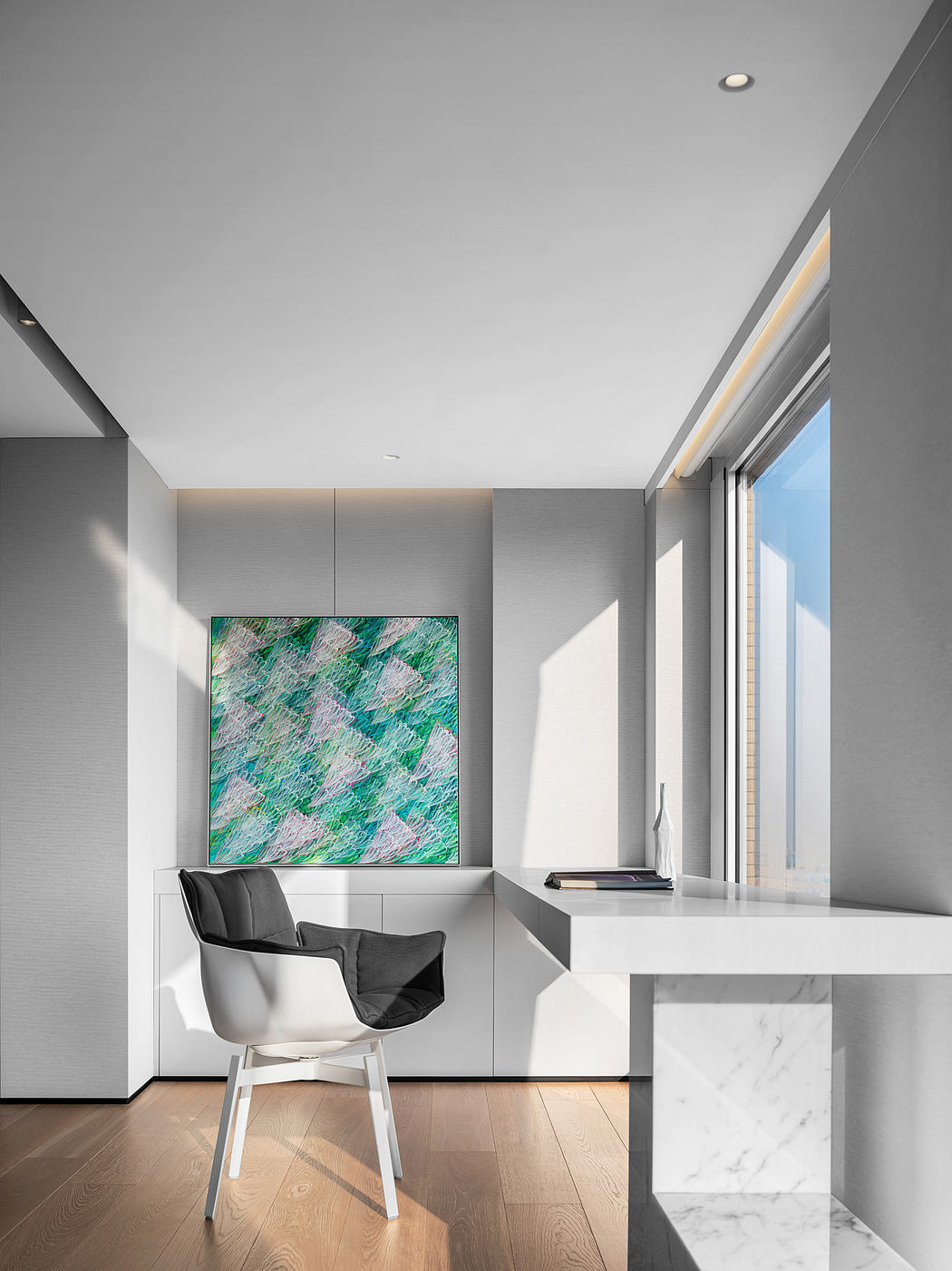 Modern, minimalist interior with a vibrant abstract artwork, sleek furniture, and ample natural light.