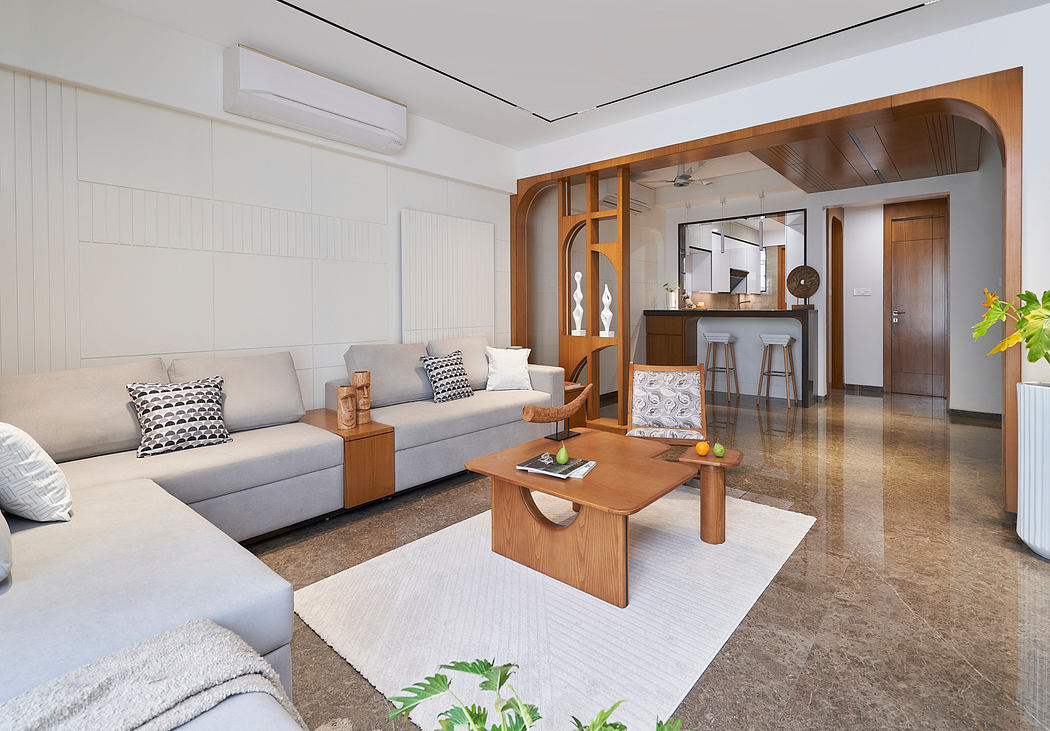 A spacious modern living room with wooden accents, sleek furniture, and an open floor plan.