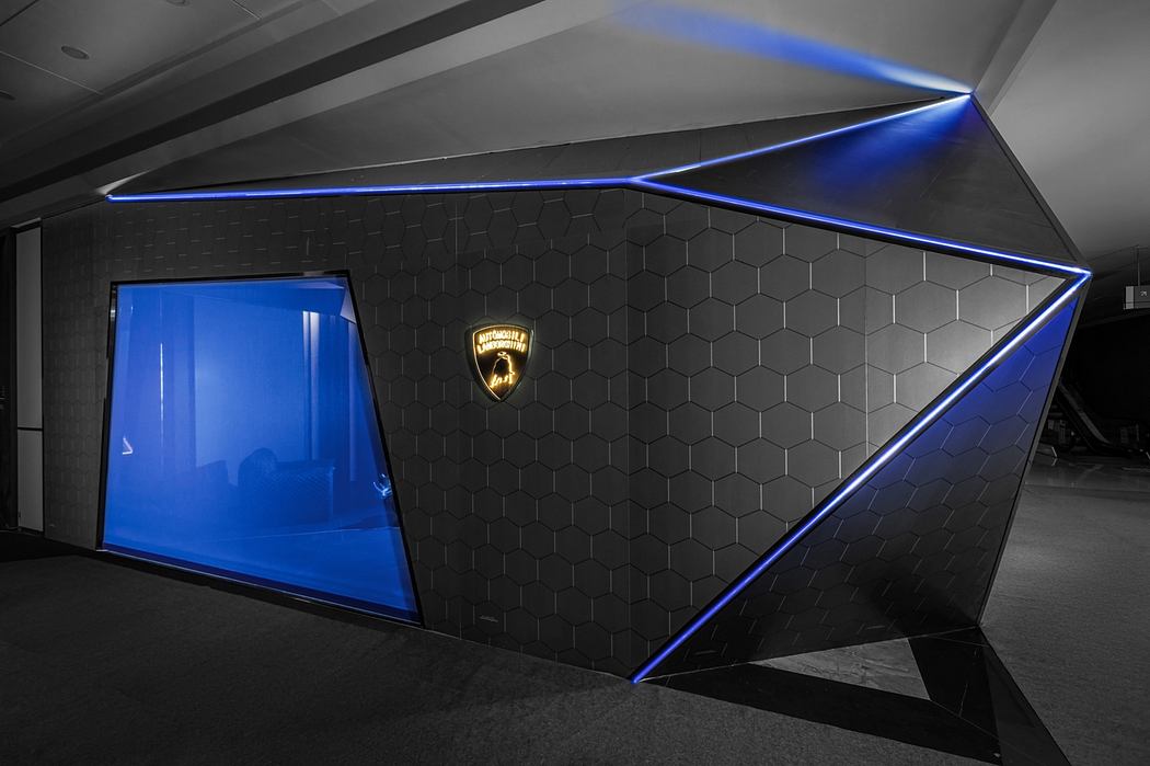 Modern angular architecture with hexagonal patterns and neon blue accents.