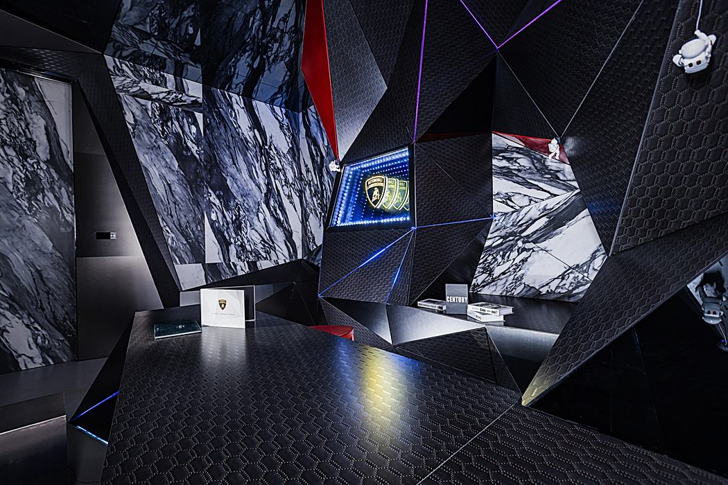 Striking geometric patterns, bold contrasting colors, and sleek, modern architectural details.