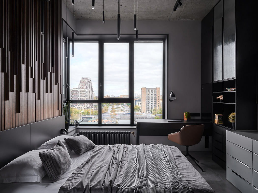 Sleek, modern bedroom with sweeping city views, wall paneling, and minimalist decor.