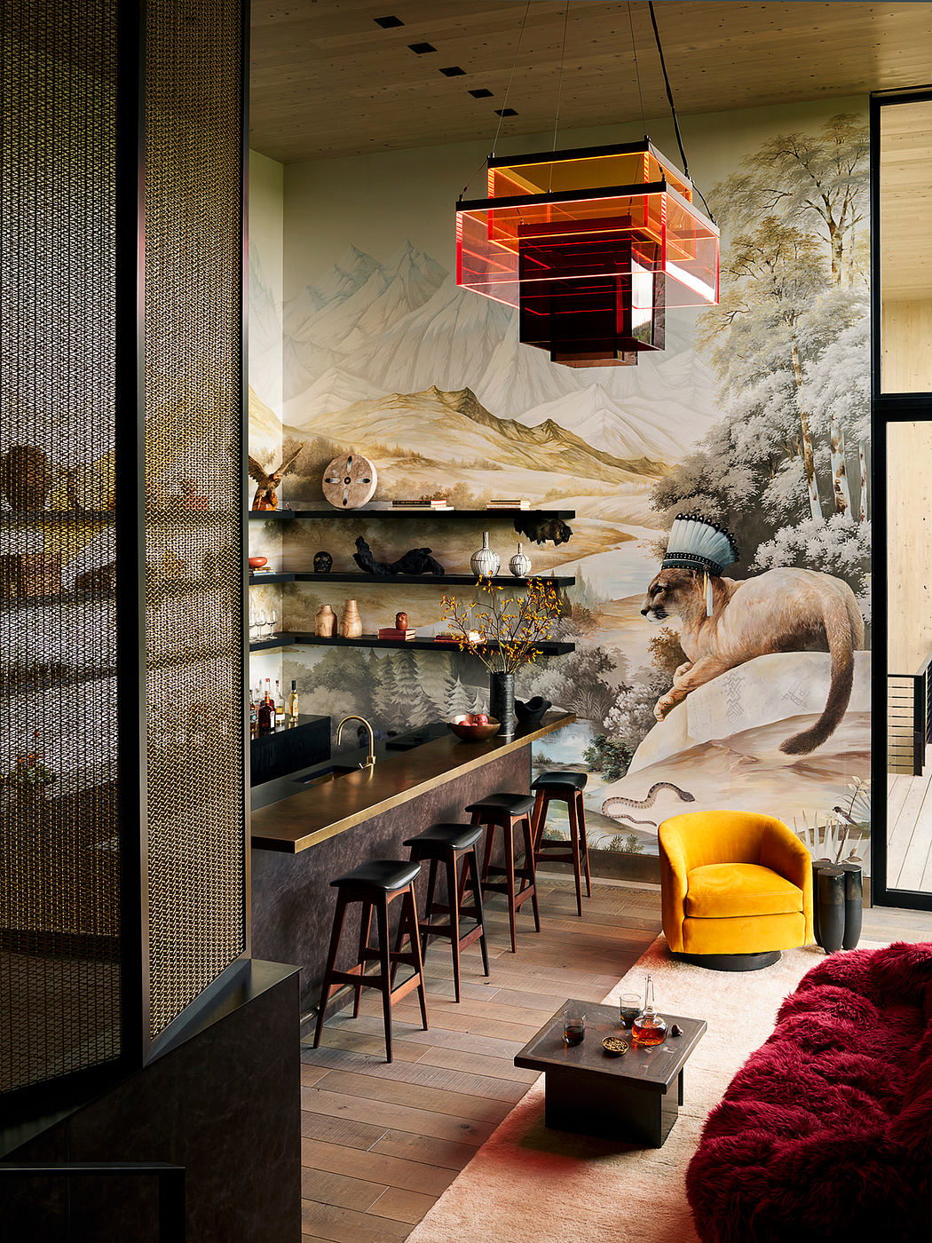 Eclectic and vibrant modern lounge with stylized mountain mural, statement lighting.