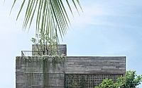 001-rach-gia-house-coastal-retreat-with-vertical-greenery.jpg