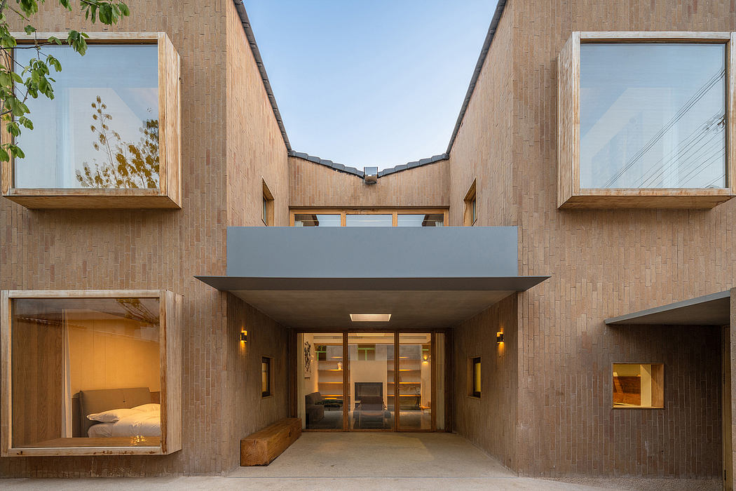 Minimalist architectural design with brick facade, clerestory windows, and recessed entry.