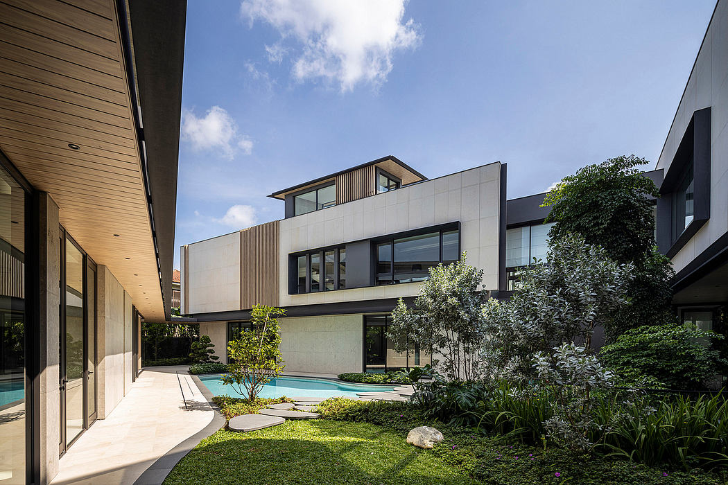 Sleek, modern exterior with wood and glass accents, surrounded by lush landscaping.