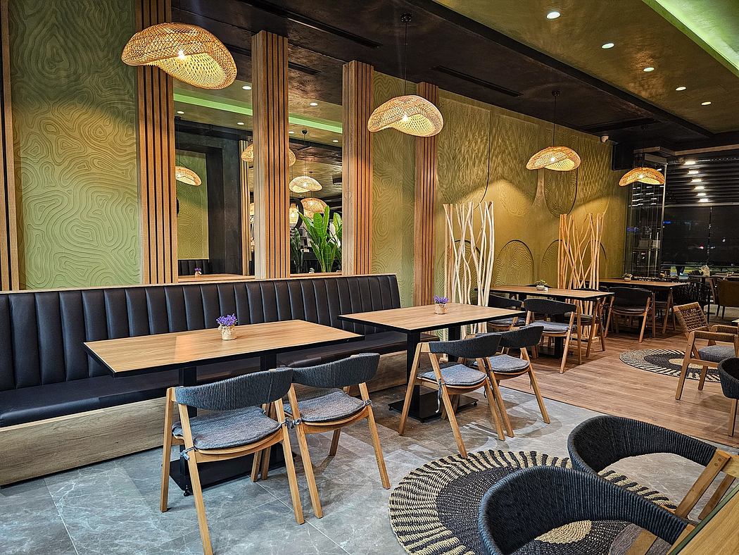 A cozy, chic restaurant featuring woven pendant lamps, wooden furniture, and vibrant wall textures.