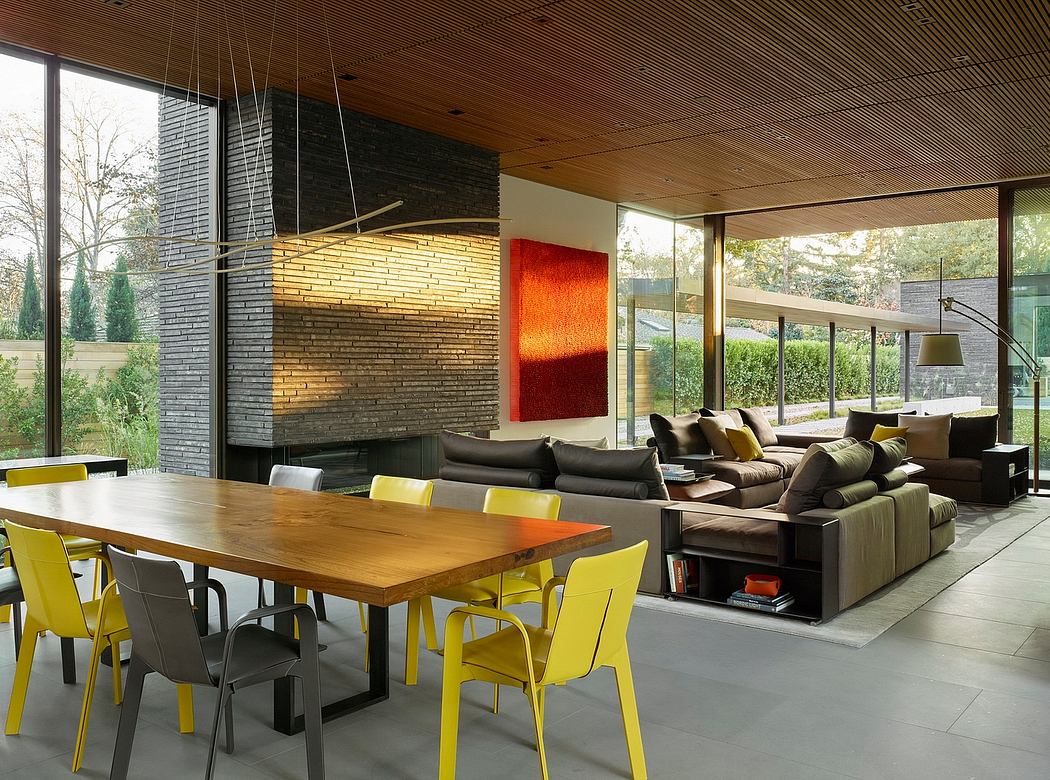 Striking architectural design featuring brick walls, wood ceiling, and modern furnishings.